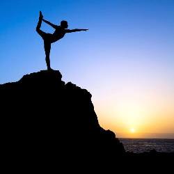 Doing a Yoga Posture on High Rock